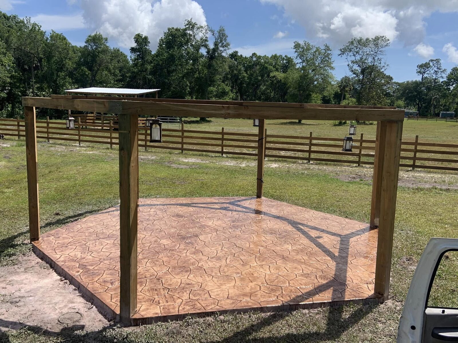 Patio and pergola over decorative concrete